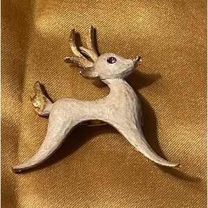 Vintage Mamselle Signed reindeer w/pink rhinestone eye. Cream paint over gold